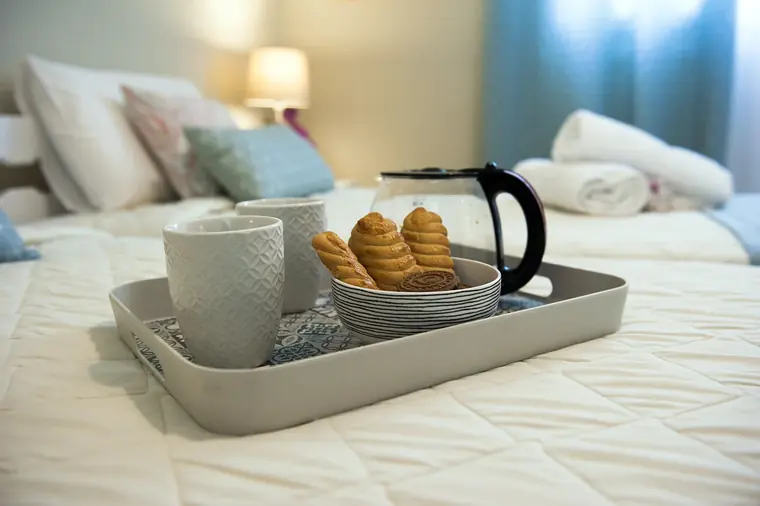 A coffee tray on the bed