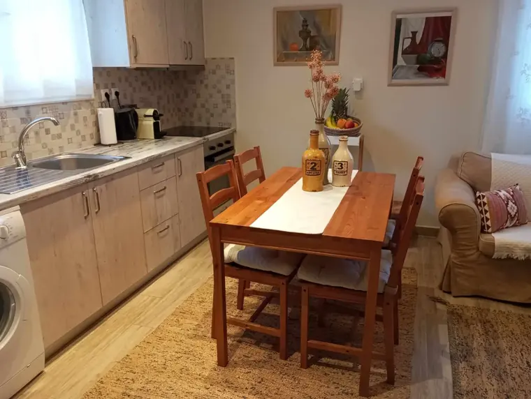 The dining table by the kitchen
